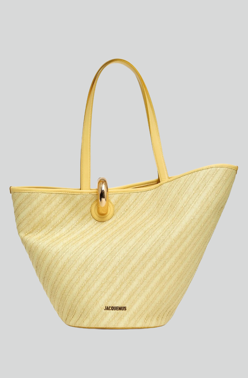 Yellow assymetric bag by Jacquemus